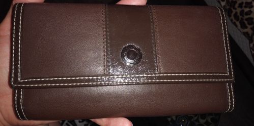 Brown coach wallet with check book holder