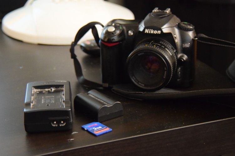 Nikon D50/Nikon Strap/50mm Prime lens/Battery/Charger MH-18a/Memory 2gb Memory Card
