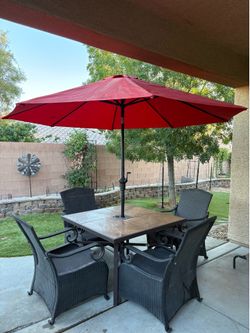 Table+ 4 chairs and umbrella for $180 OBO