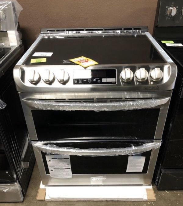 LG electric glass top stove! Brand new with warranty for Sale in Dallas