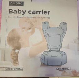 Baby carrier/ 0-36 months/ new/ $40 cash only/ blue diamond & rainbow