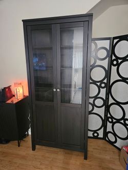 Ikea dark wood/glass bookcase