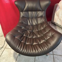 Brown leather relax Cocoon armchair. 