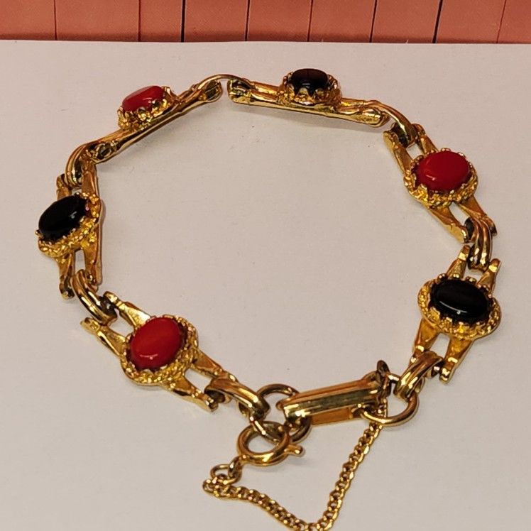 #2421, MIDCENTURY GOLD PLATED BRACELET, NATURAL CORALS AND ONYX STONES
