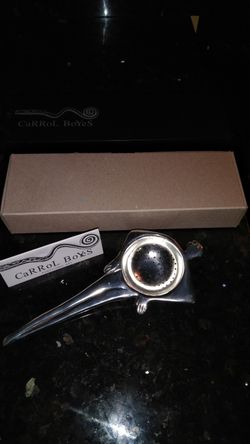 Carrol Boyes Tea Strainer - Man in pewter.