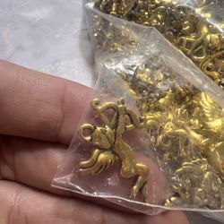 cupid-shaped necklace charms