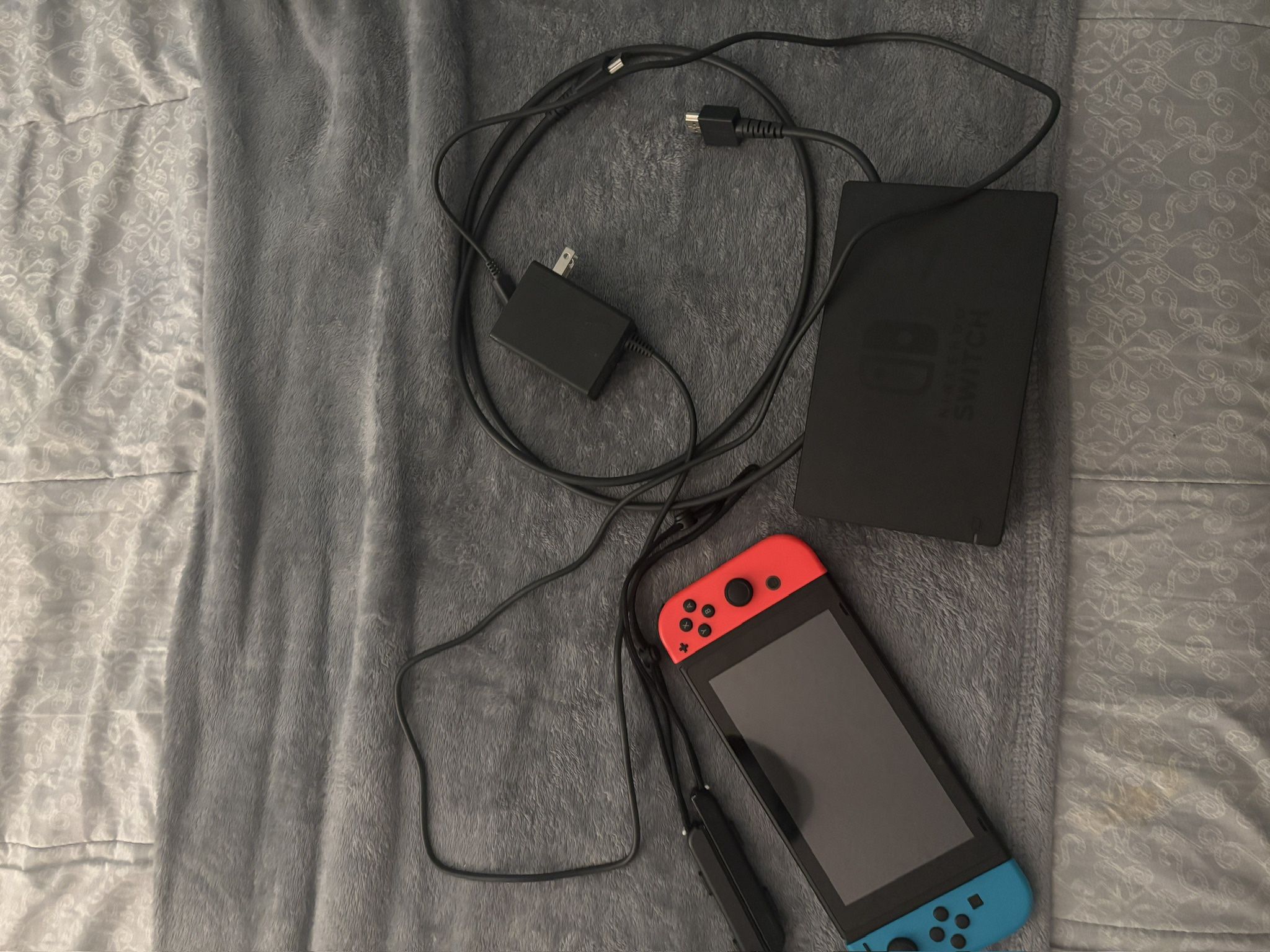 Nintendo Switch Console with Red and Blue Joy-Con