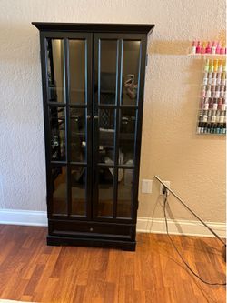 Cabinet with shelving