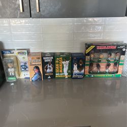 Various Bobble heads And Toy Figures