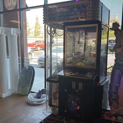 Claw Machine with Stuffed Animals