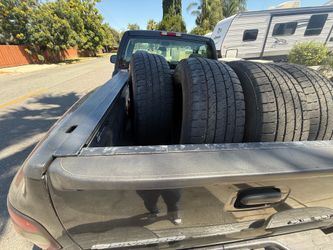 Rim and tires off of a Chevy
