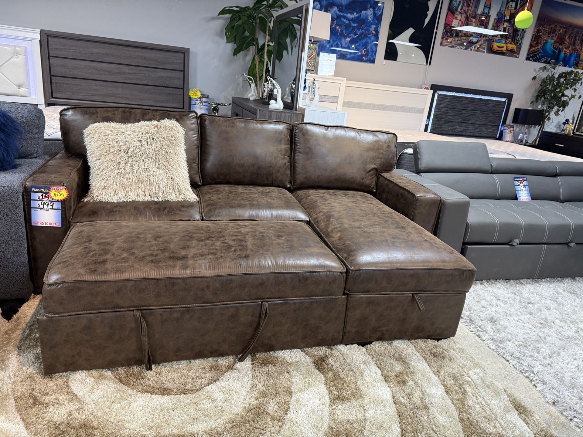 Sleeper Sectional With Drop Down Console And Storage Chaise Only $699