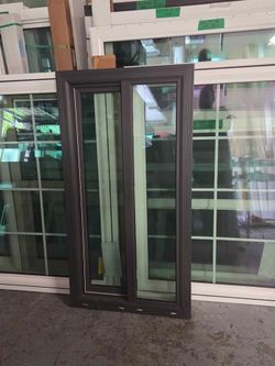 Brand New 26W x 50H PGT WinGuard Impact sliding Window