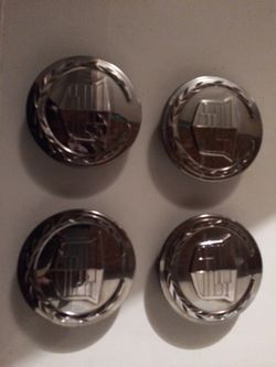 Cadillac center caps 3.2 inches