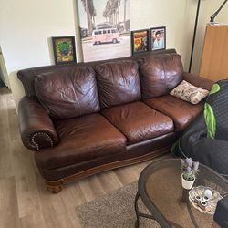 Leather couches ( Qty 2 )- 35$ each, recliner with leg rest - 20$, glass coffee  table - 25.