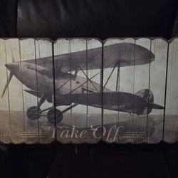 Wall art titled "fly away" and "take off"