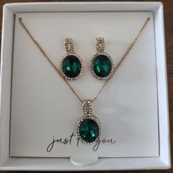 Gold Colored Necklace And Earrings With Emerald Colored Stones 