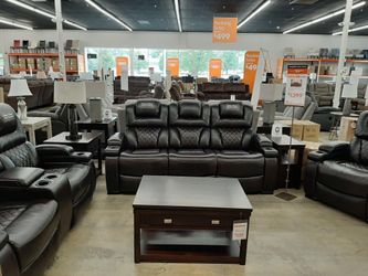 Power reclining sofa or love seat available for immediate delivery