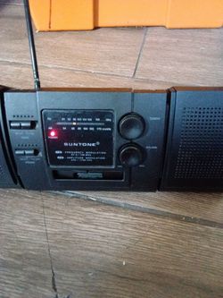 Older portable radio speakers slide off of radio