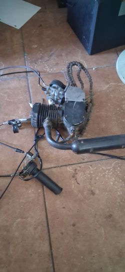A complete 2-stroke motorized bicycle engine