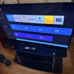 50" Sony Bravia UHD TV with stand and remote