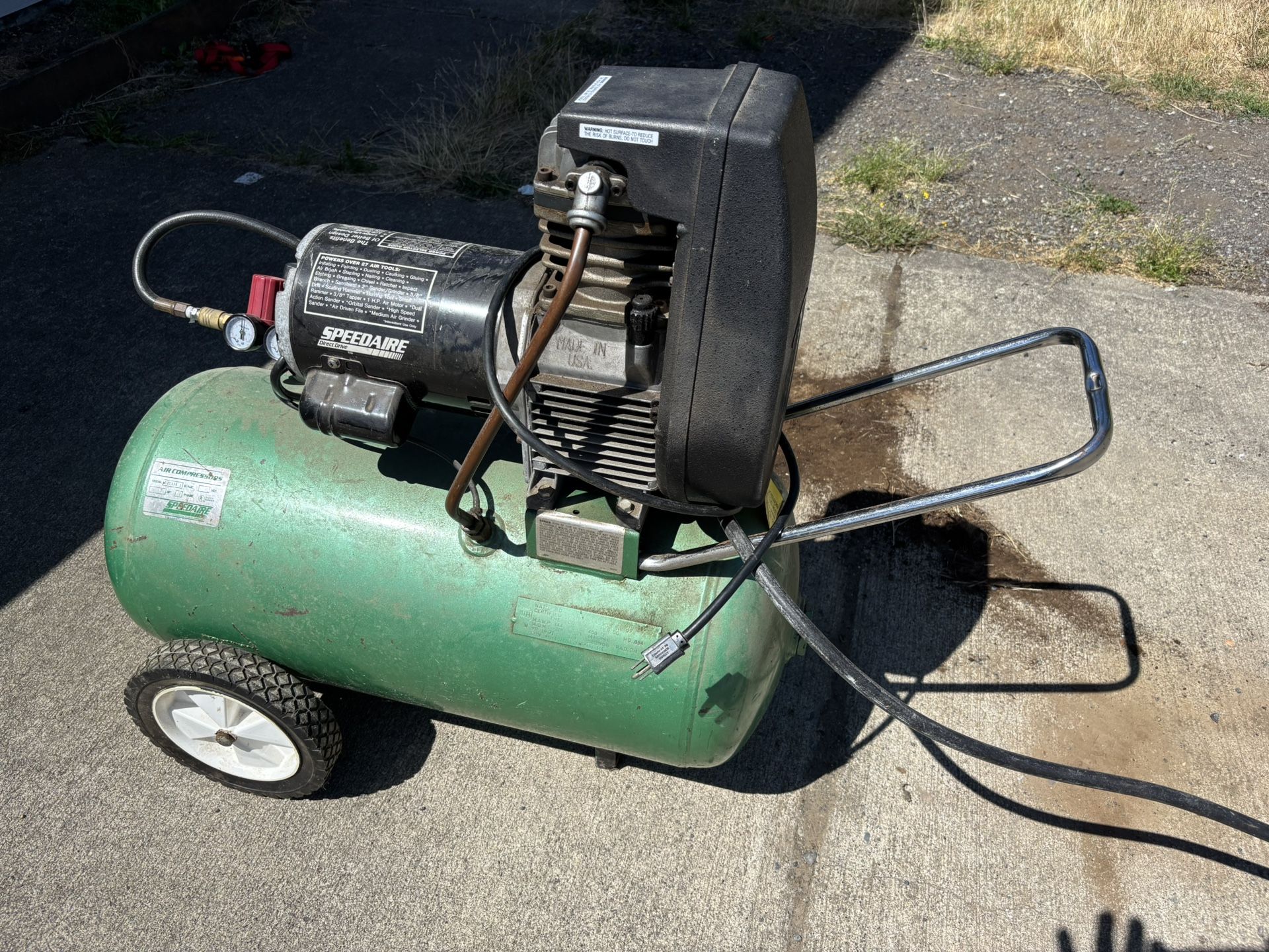 Multiple Tools Air compressor, With 25ft Long Hose, chainsaw, 3 ton low profile car jack and rolling seats and creeper for sale