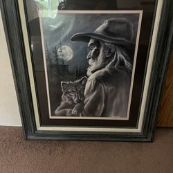 Mountain man and wolf picture