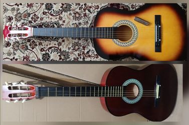 2 Dobro style lap steel guitars