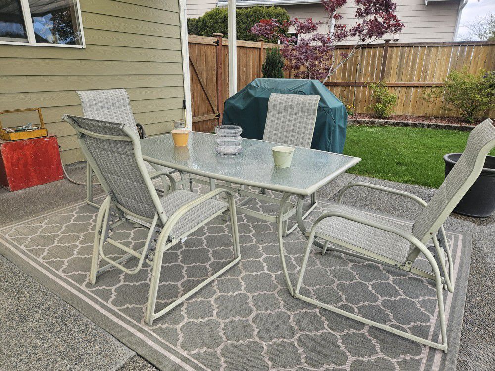 Patio Table With 4 Chairs And 2 Extra Chairs With Foot Stools And Round Cocktail Table