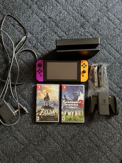 Nintendo Switch with Xenoblade and Zelda
