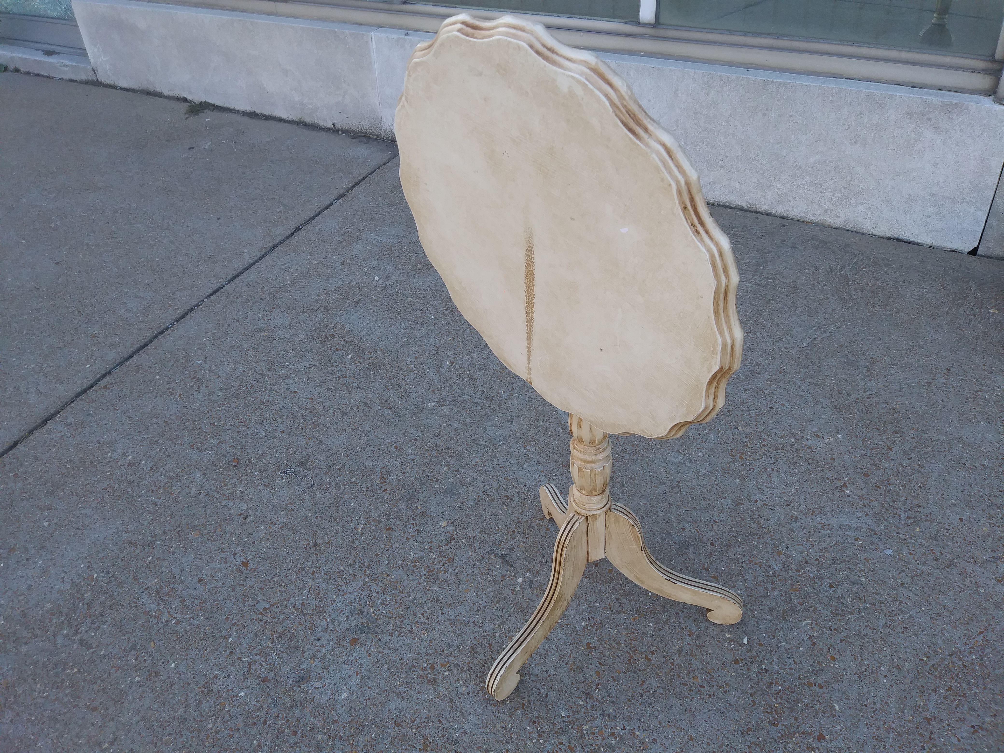 Antique off white tilt top three legged table for sale