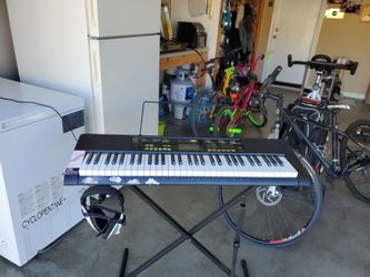Casio CTK-2400 61-Key Portable Electronic Keyboard