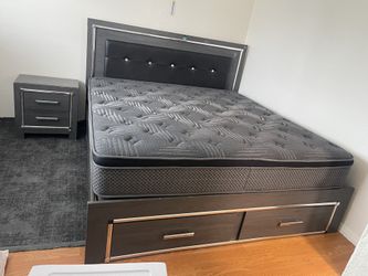 Queen size bed frame with mattress. Both are in good condition, clean, and ready for pickup.
