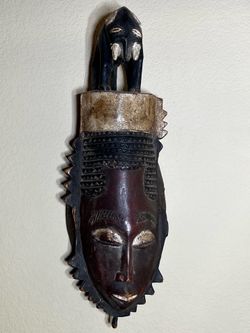 Baule or Yaure hand carved antique wooden mask from the Ivory Coast (Côte d'Ivoire)