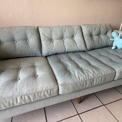 Two comfortable light  green sofa + One Comfortable beige recliner chair + One Doll house full with toys .