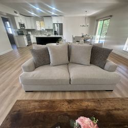 Gray Couch And Swivel Chair