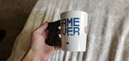 Dave and buster's Game Coffee Cup $5