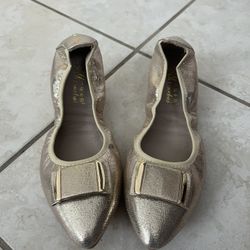 Gold flat shoes