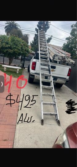 Excellent condition, 40 Feet and more sizes available aluminum extension, Ladders