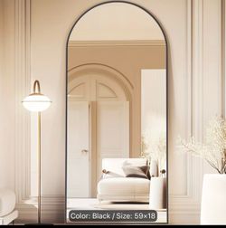 A Full-Length Mirror Measuring 59"X18", Arched Design