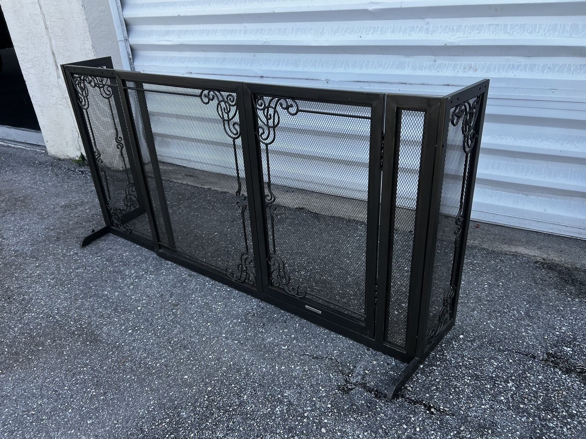 FrontGate 34"H Expandable Metal Freestanding Mesh Pet Gate with Door. Expands in 2" increments from 55" to 68-1/2" wide.