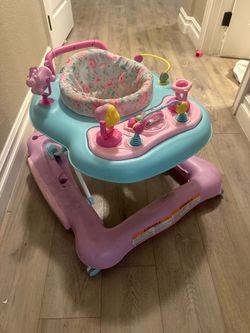 Girls pink baby walker