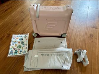 Stokke JetKids BedBox, Pink Lemonade - Ride-On Suitcase for Kids 2-7 Years Old (up to 77 lbs) - Transforms Into Bed - Includes Mattress, Decorative St