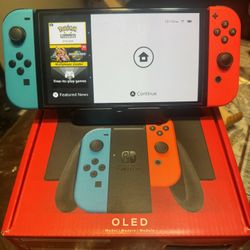 Nintendo Switch OLED with 2 games
