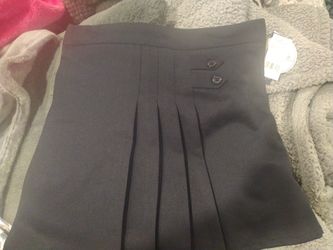 5 Skirts At $15 Each Brand New In Plastic Wrap.