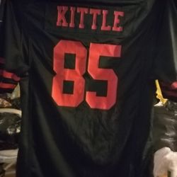 A  KITTLE  49er Black And Red Jersey With Number 85 On It.  Size XL