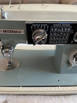Dress maker antique sewing machine