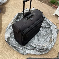 A Nice, Black 40” Long (when Open) X 23” Wide, With Many Components,wheels, And Long Enough To Hang Your Clothes ( NO SHIPPING)