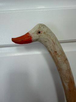 hand-carved wooden walking stick featuring a goose head handle, 45 inches