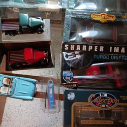 8 Die Cast Models & 1 Ford Gas Pump.